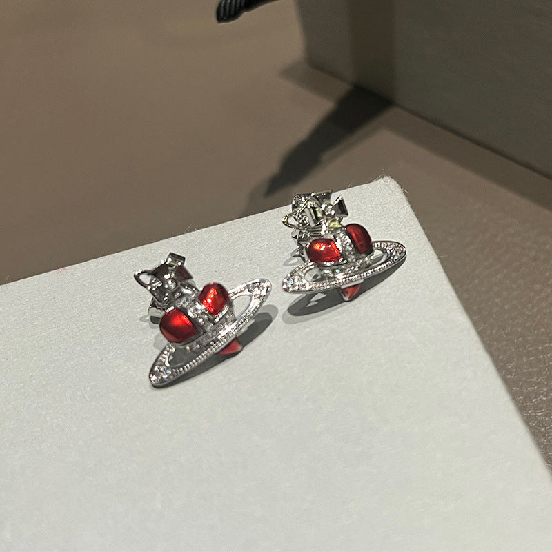 The Queen Mother of the West, classic enamel paint, crooked love Saturn stud earrings, diamond-inlaid heart-shaped peach heart earrings, niche design sense