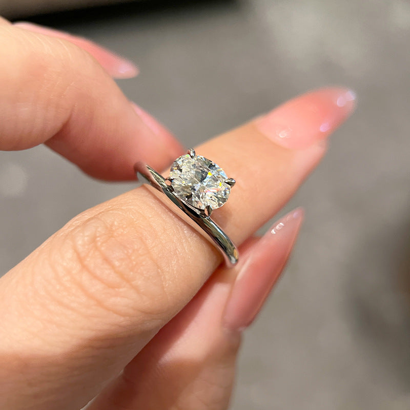 Live broadcast hit minimalist twist arm oval pigeon egg single diamond ring silver irregular streamlined jewelry imitation diamond