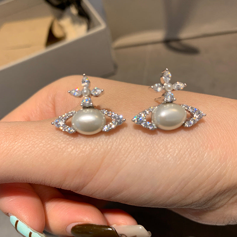Seiko Queen West oval pearl stud earrings burst flash, cross marquise diamond planet earrings, high-end sense of live broadcast hits