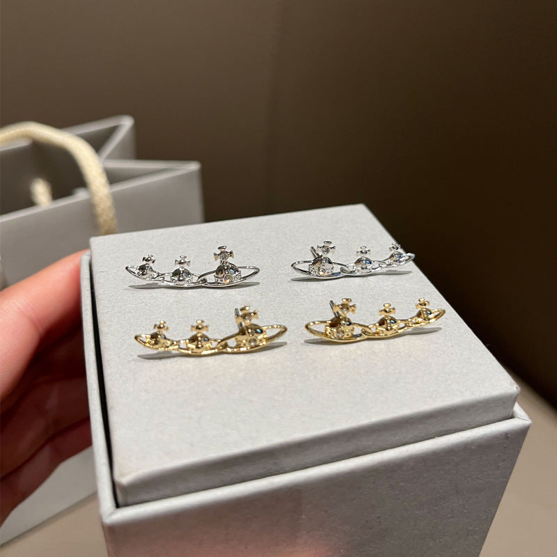 Three rows of Saturn stud earrings for the Queen Mother of the West gold and silver earrings