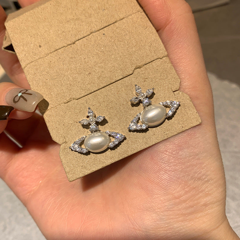 Seiko Queen West oval pearl stud earrings burst flash, cross marquise diamond planet earrings, high-end sense of live broadcast hits