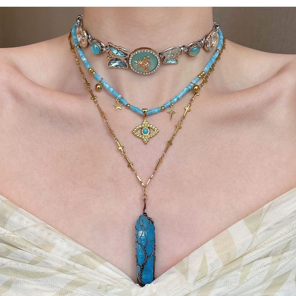 Devil's eye butterfly beaded necklace choker stacked wearing babes