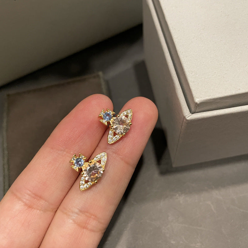 Small Queen Mother West Single Diamond Full Diamond Small Saturn Stud Earrings Colored Diamond Round Diamond Saturn Earrings