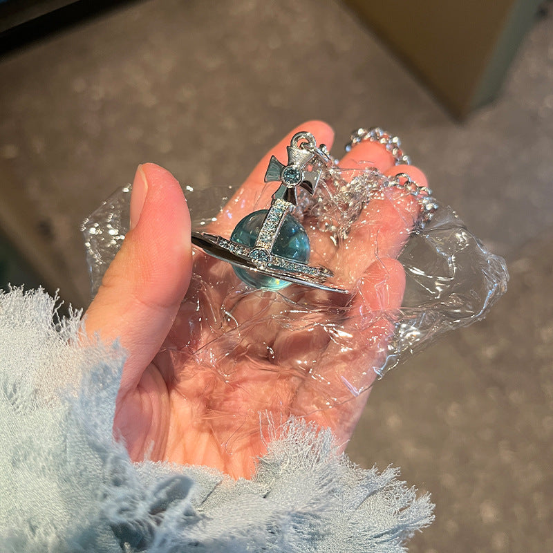 Queen Mother West Large Glacier Blue Flyer orb necklace three-dimensional Saturn planet pendant colored diamond sweater chain long chain