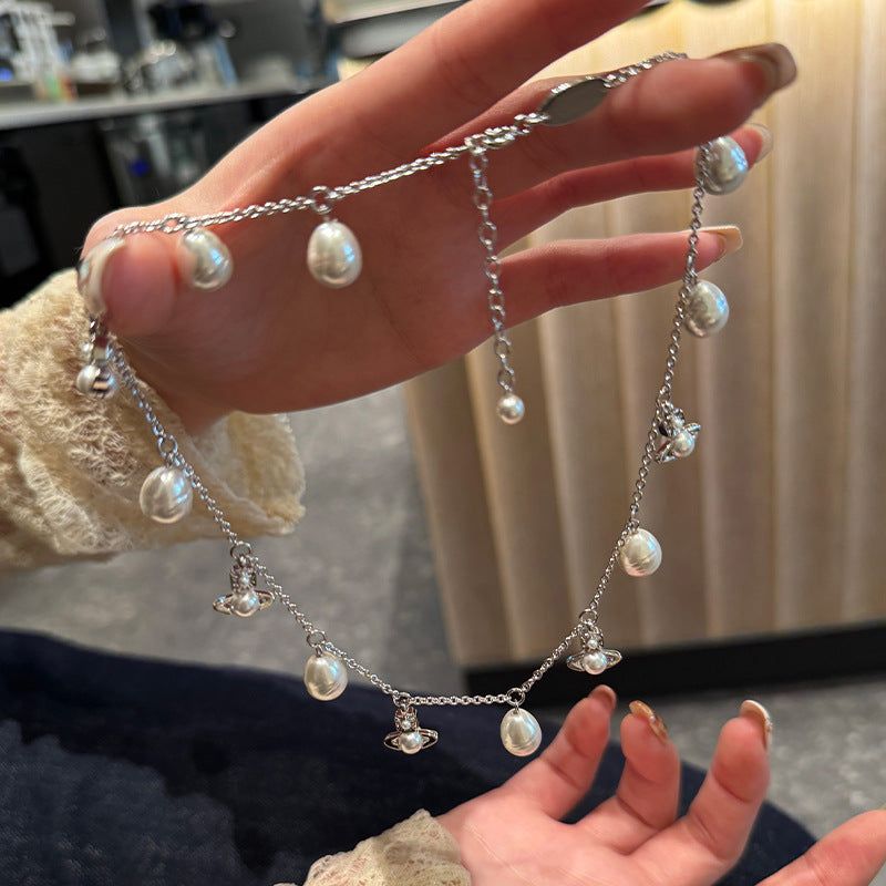 Queen Mother West's new baroque pearl small Saturn necklace Seiko strong light pearl fashionable stacking clavicle chain