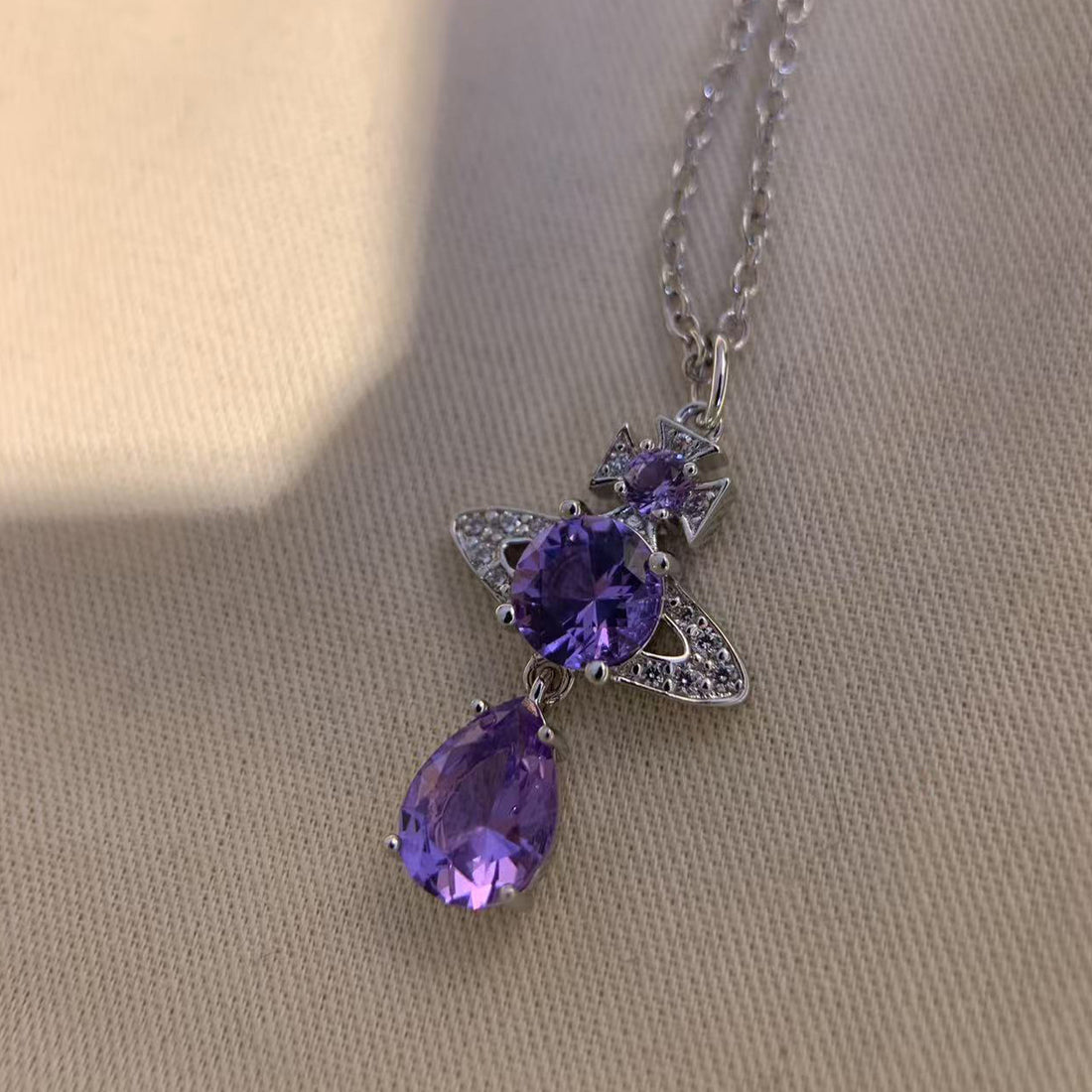 Live broadcast explosive Queen Mother Xi purple diamond mermaid tears necklace popping flash Seiko thick gold drip diamond Saturn pendant necklace