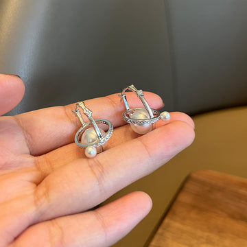 Seiko three-dimensional universe planet earrings S925 silver fungus needle Shijia pearl double bead earrings niche high-end earrings