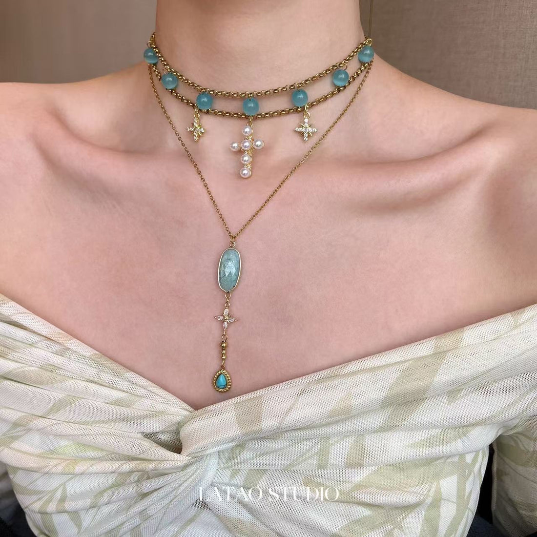 Original blue cat eye Tianhe stone mango star cross titanium steel necklace stacked with Spice Girl