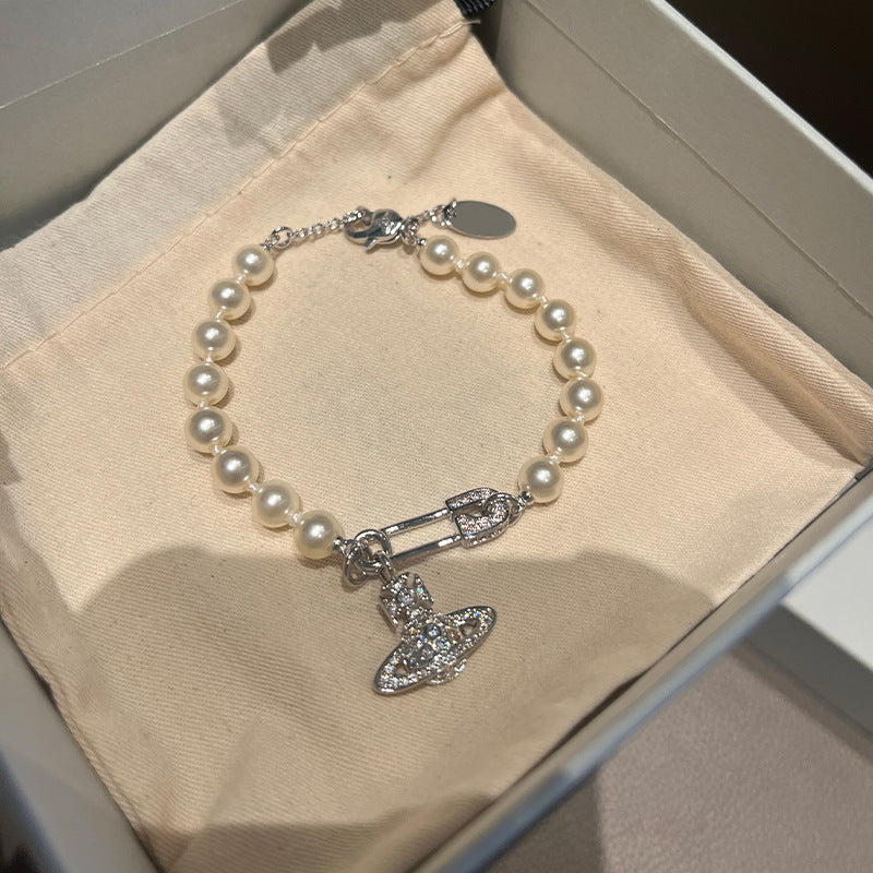 Queen Mother West pin pearl bracelet Saturn paper clip hand ornament Shijia pearl bracelet blogger planting grass