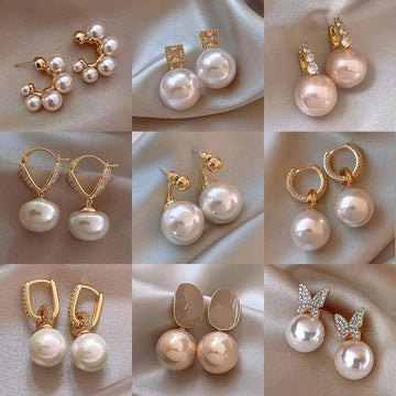 Fashionable high-end zircon pearl earrings french niche retro light luxury stud earrings 2025 new earrings wholesale