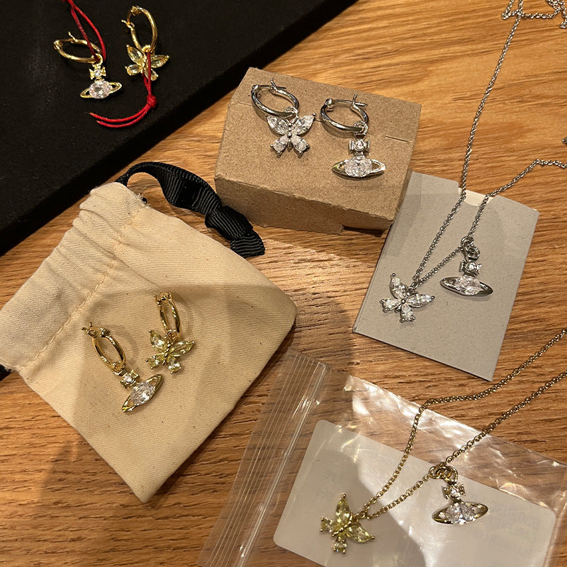 The new Queen Mother of the West diamond butterfly Saturn necklace earrings are fine-set with orb earrings and chokers