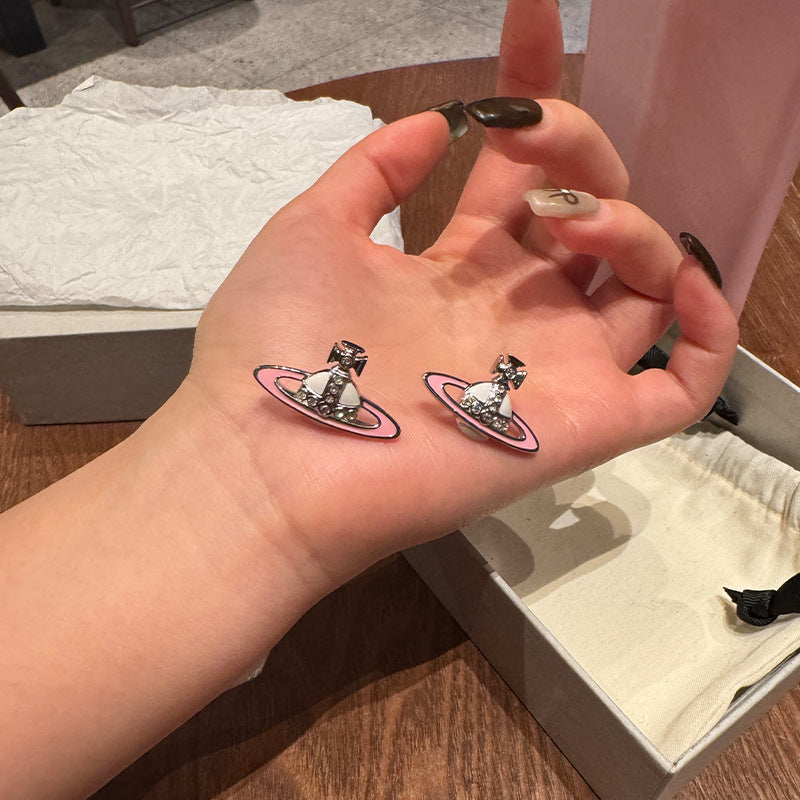 Queen West pink and white enamel Saturn stud earrings Seiko two-tone lacquer diamond orb earrings versatile everyday model