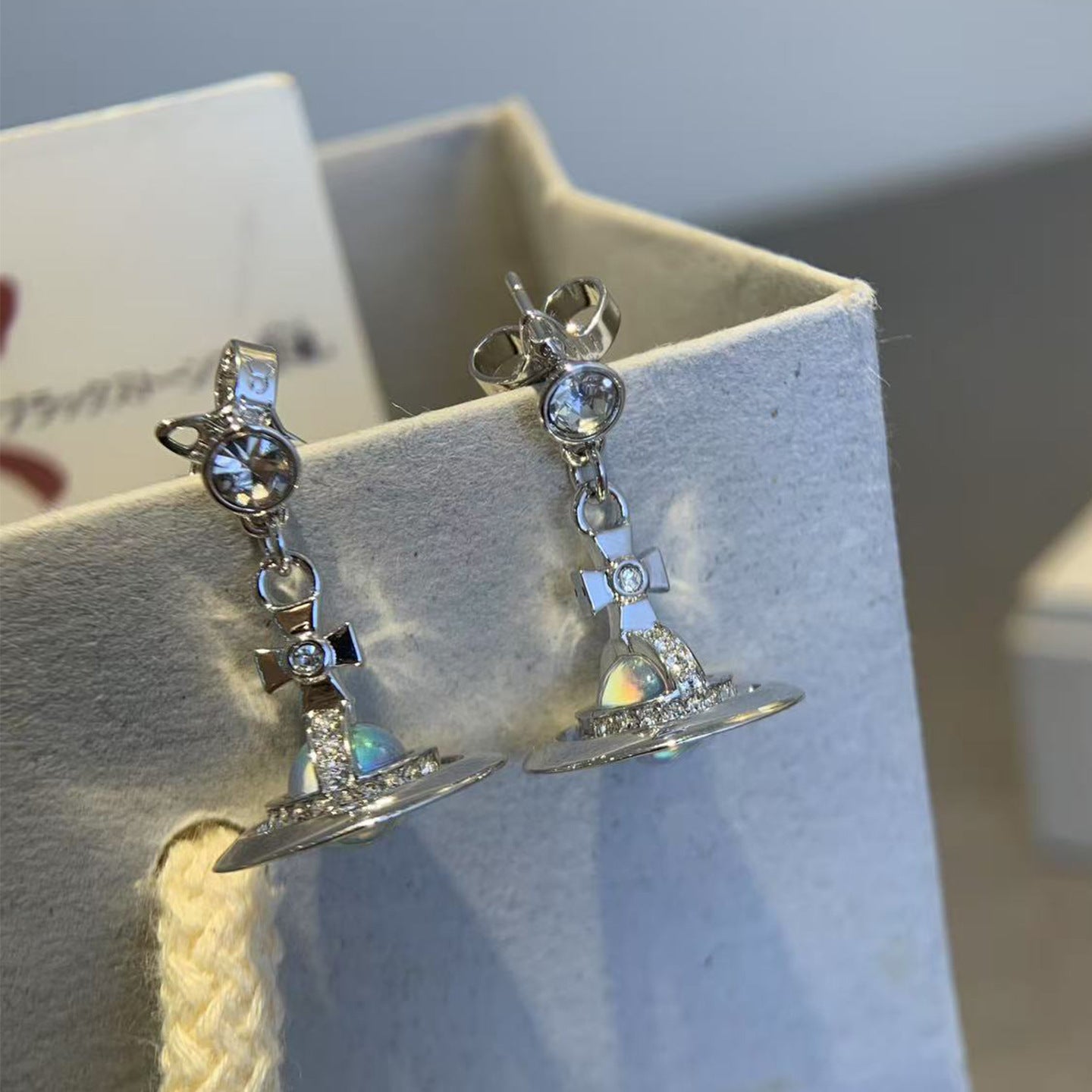 New Queen Mother of the West Aurora Aviator Earrings Seiko Laser Illusion Three-Dimensional Saturn Orb Earrings