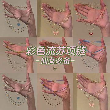 Super fairy color double-layer stacked butterfly necklace light luxury niche design versatile fringed collarbone chain jewelry wholesale