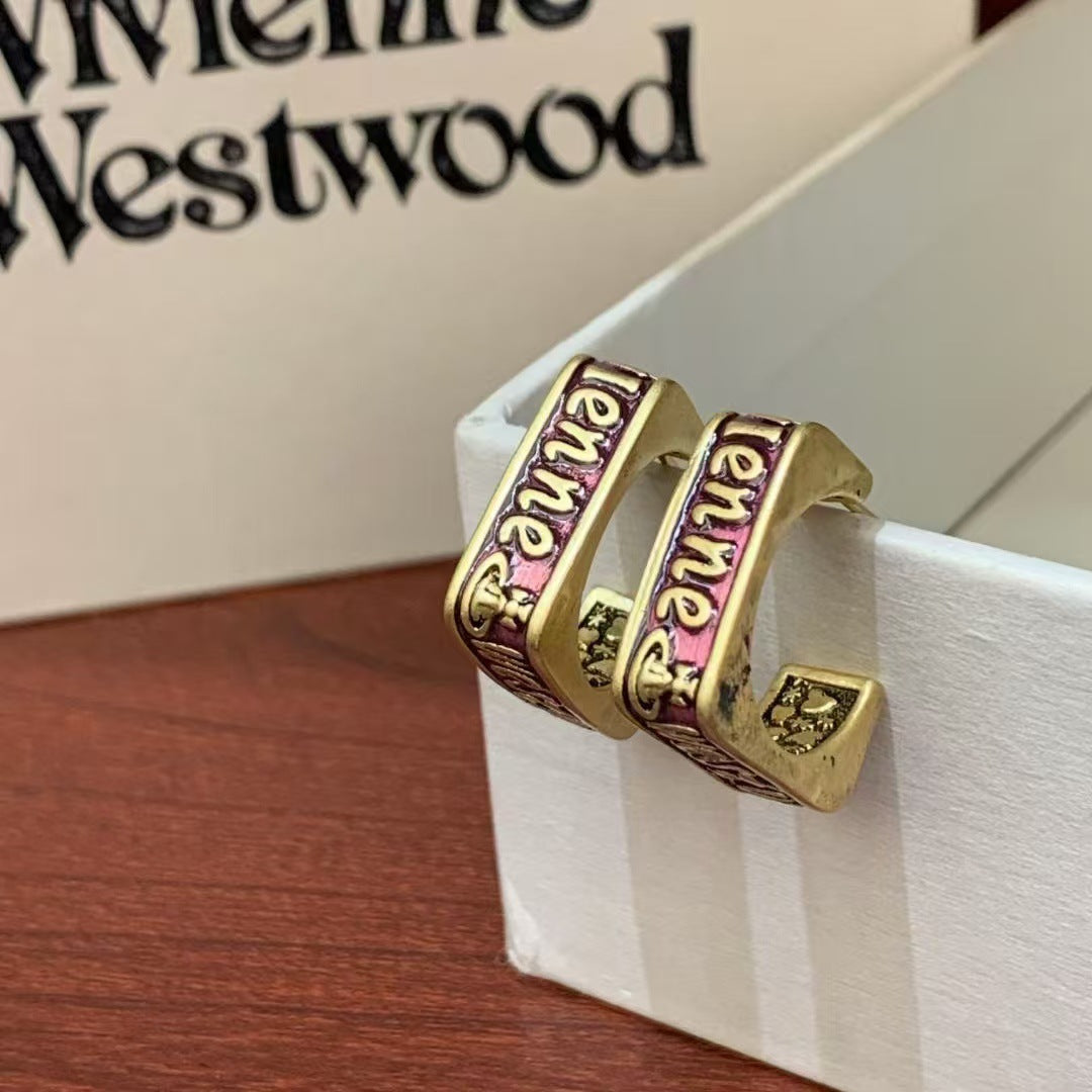 Vintage medieval high-end love pearl planet stud earrings niche dripping oil light luxury Saturn earrings accessories