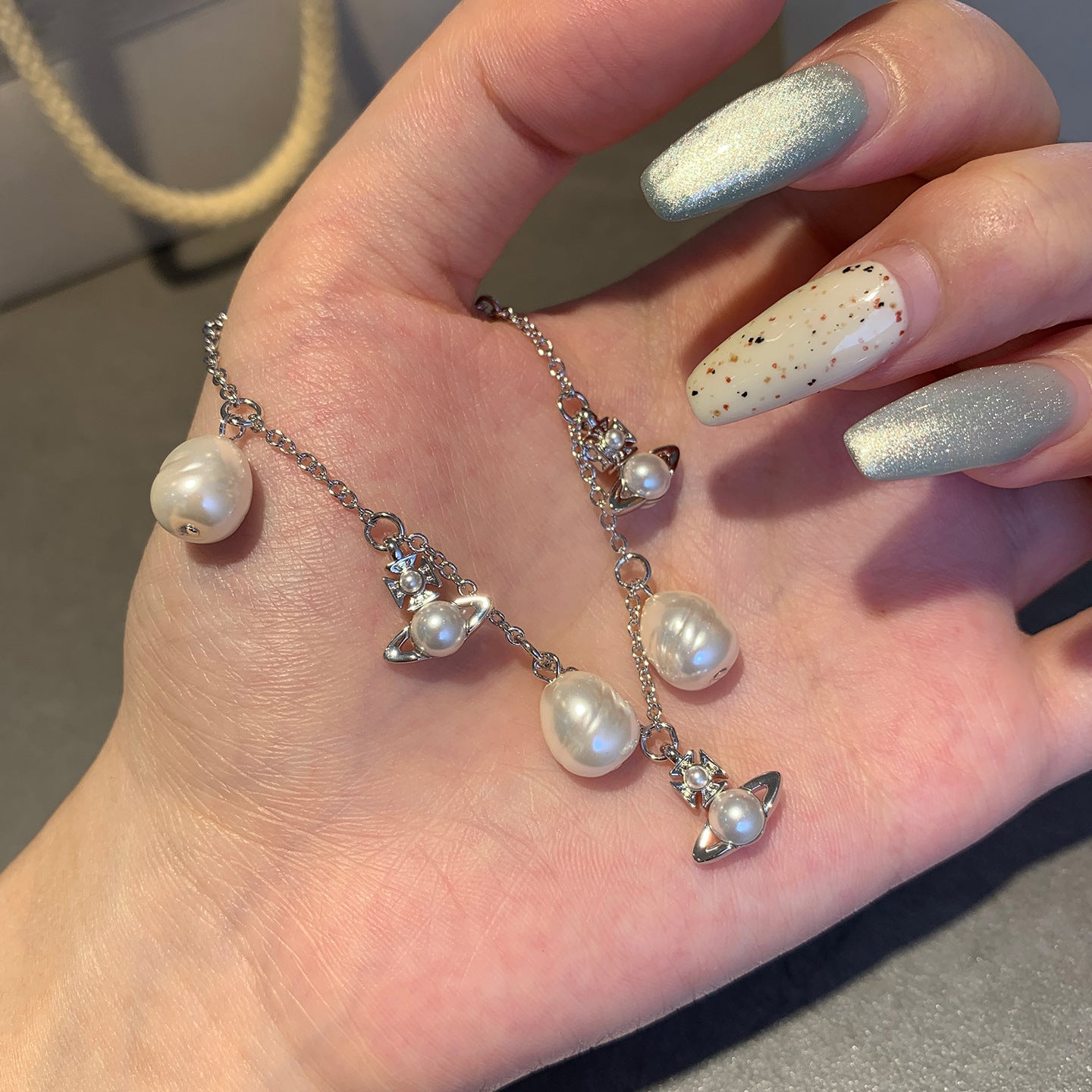 Queen Mother of the West new baroque pearl small Saturn bracelet Seiko strong light pearl fashionable and versatile design hand jewelry