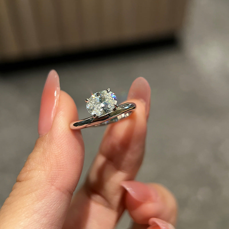 Live broadcast hit minimalist twist arm oval pigeon egg single diamond ring silver irregular streamlined jewelry imitation diamond