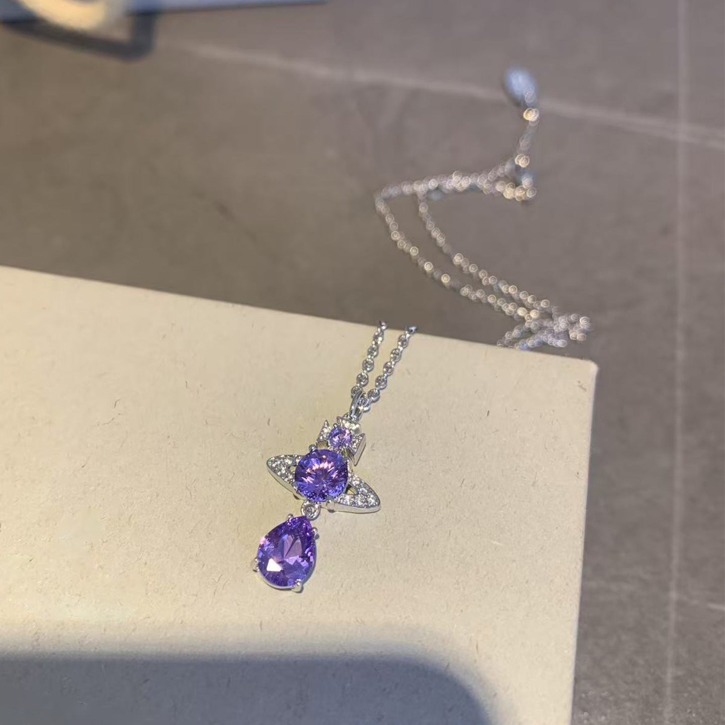 Live broadcast explosive Queen Mother Xi purple diamond mermaid tears necklace popping flash Seiko thick gold drip diamond Saturn pendant necklace