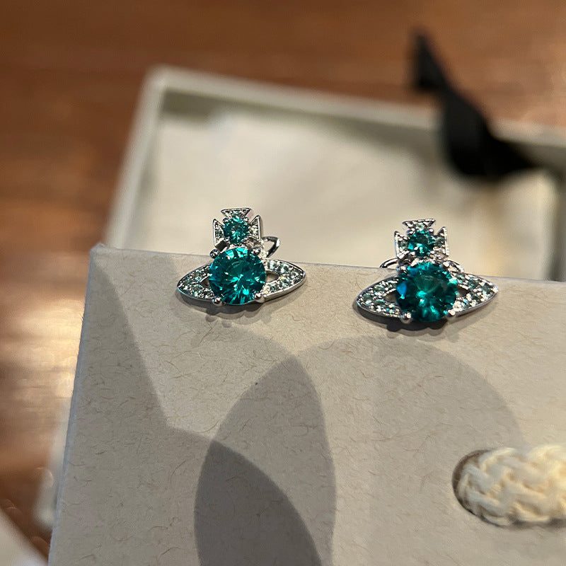 The high version of the Empress Dowager West emerald solitaire Saturn stud earrings limited flash high-end gemstone earrings live broadcast hit