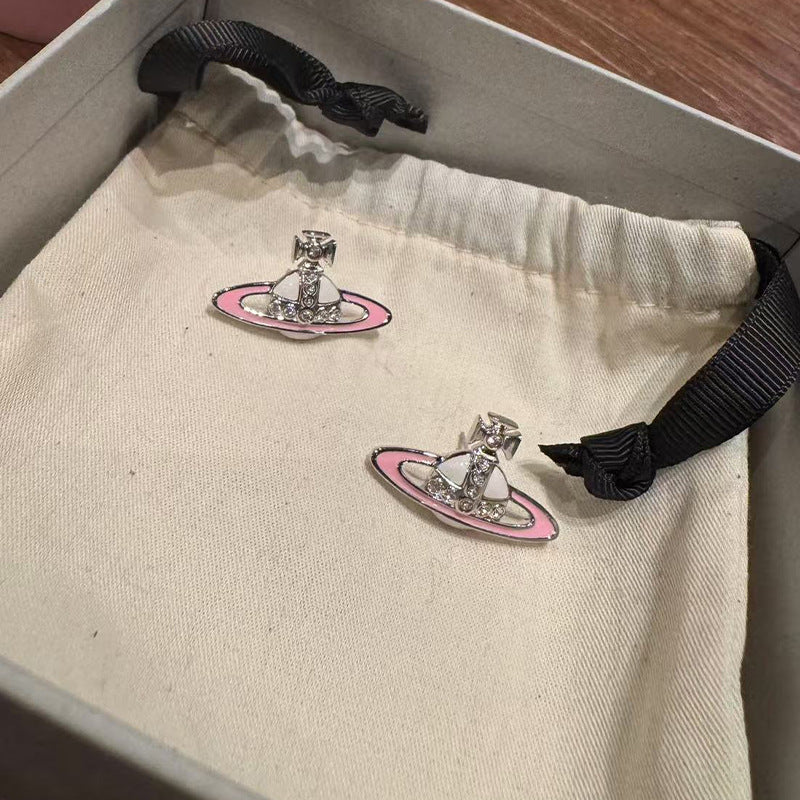 Queen West pink and white enamel Saturn stud earrings Seiko two-tone lacquer diamond orb earrings versatile everyday model