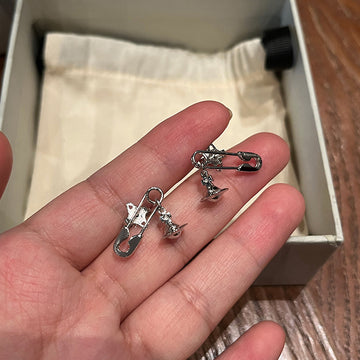 Queen Mother of the West pin three-dimensional Saturn stud earrings minimalist silver earrings pin bright paper clip planet daily earrings earrings