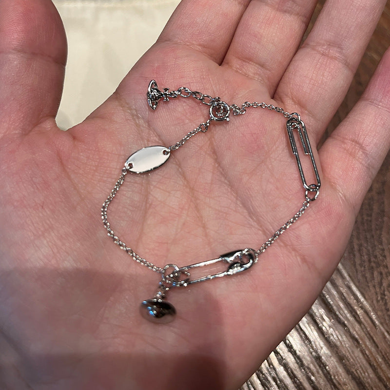 High version of the Queen Mother of the West pin three-dimensional Saturn bracelet minimalist commuter style silver chain glossy paper clip planet bracelet