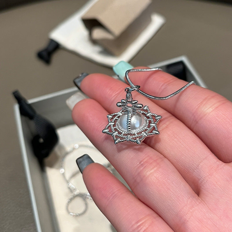 The Queen Mother of the West medieval weaving court wind and snowflake eight-pointed star pearl orb necklace three-dimensional Saturn pendant long chain