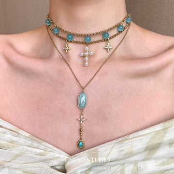 Original blue cat eye Tianhe stone mango star cross titanium steel necklace stacked with Spice Girl