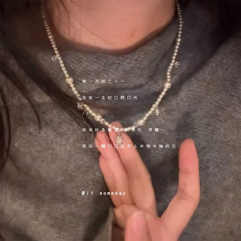 High-end light luxury pearl necklace women's autumn and winter retro niche design temperament collarbone chain 2026 new sweater chain