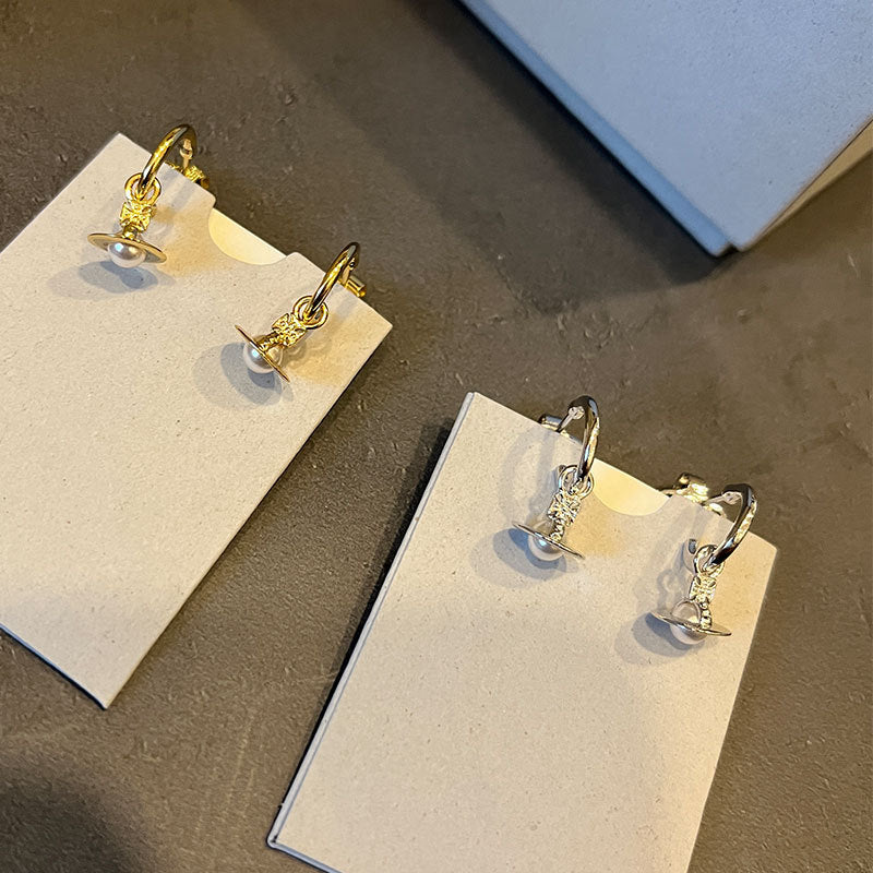 The new Queen Mother layla pearl mini earrings three-dimensional Saturn earrings for daily commuting