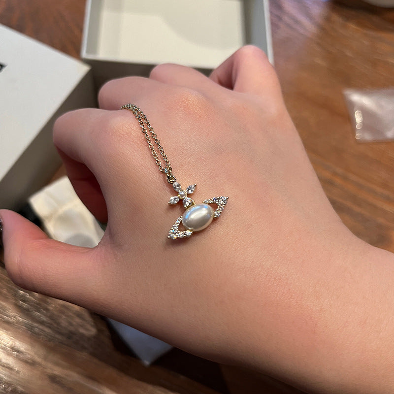 The high version of the Queen Mother of the West oval pearl necklace burst flash cross marquise diamond planet pendant clavicle chain live broadcast hit