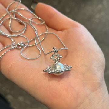 The Queen Mother of the West medieval weaving court wind and snowflake eight-pointed star pearl orb necklace three-dimensional Saturn pendant long chain